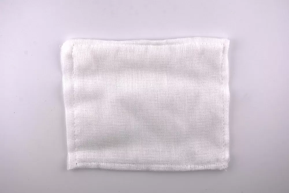 Abdoma Hasitörlő Szőtt R Szalag nélkül  13 cm x 15 cm (60 db/csomag, 24 csomag/ karton)